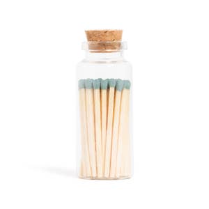 Made Market Co hand made camel colored matches in glass vessel