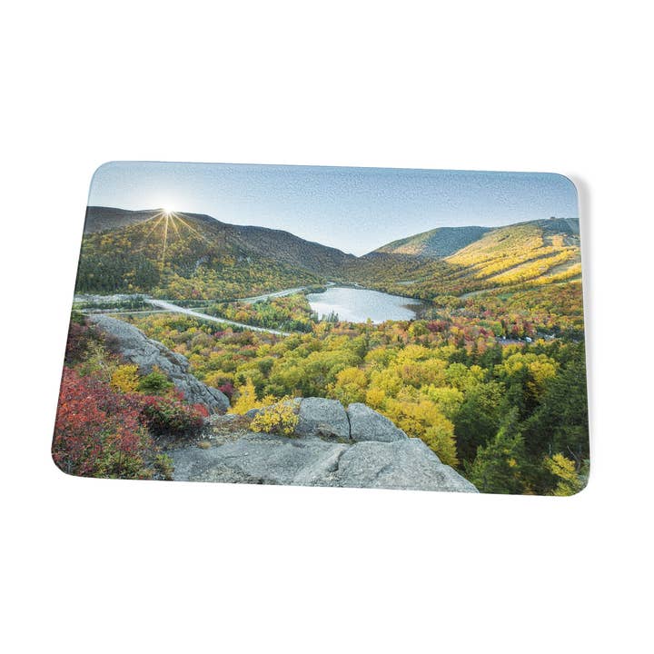 Artist Bluff Autumn Sunburst Cutting Board by Chris Whiton for wholesale by American Brand Studio