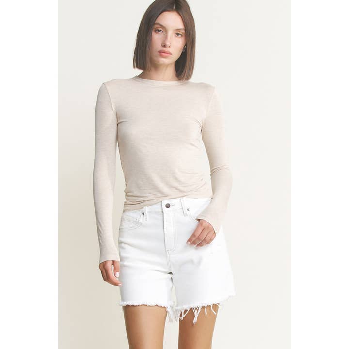 MISTY WHITE HIGH RISE DISTRESSED FRAYED HEM SHORTS for wholesale on Faire