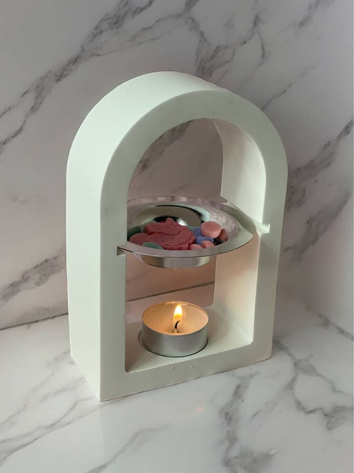 Minimalist handmade wax burner in the shape of a half point arc for wholesale by Candela Rosa