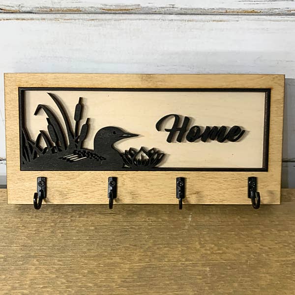 Dekorativer Schlüsselanhänger - Loon (Ente) für den Großhandel von Plums & Roses