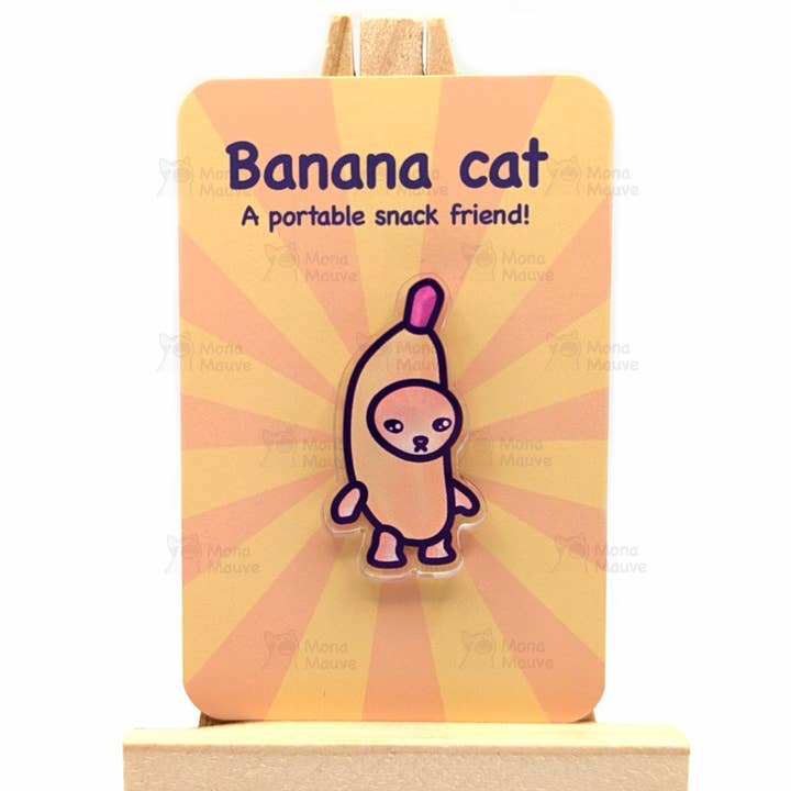 Banana Cat Pin | Snack Cats Collection | 40mm Acrylic Badge for wholesale by Mona Mauve • Silly Art!