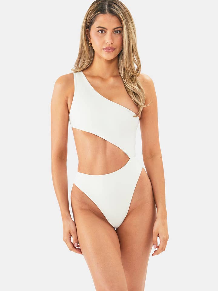 Ivory Bermuda One Piece – Nyud Swim Asymmetrical Bodysuit for wholesale by Nyud Swim