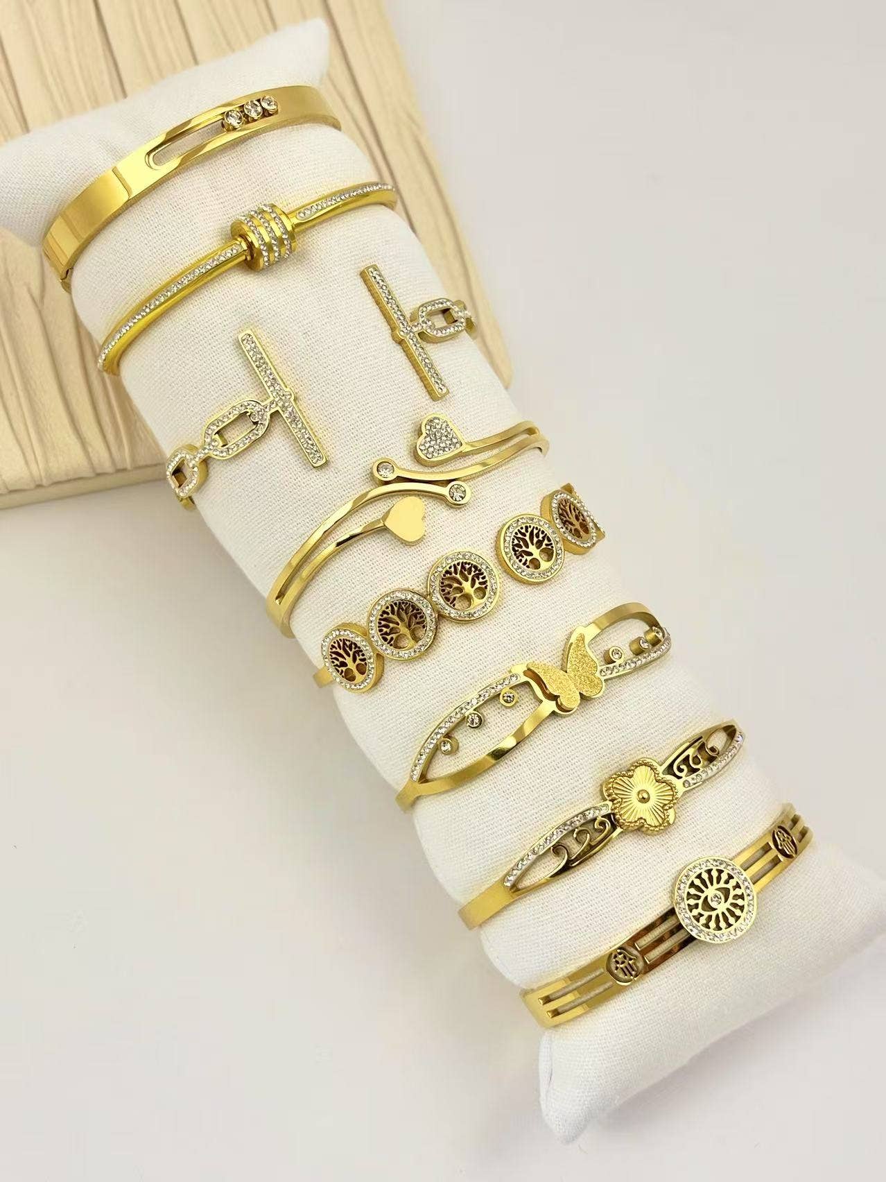 COSMOS - Wholesale Jewelry Set - Set of 8 stainless steel bangle bracelets with rhinestones, cushion included0