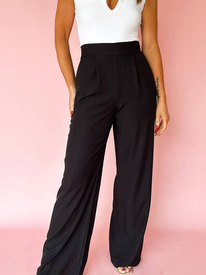 Black Pleated Detail Pull On High Elastic Waist Loose Straight Pants and other Purchase Wholesale soft pants. Free Returns & Net 60 Terms on Faire trending on Faire.