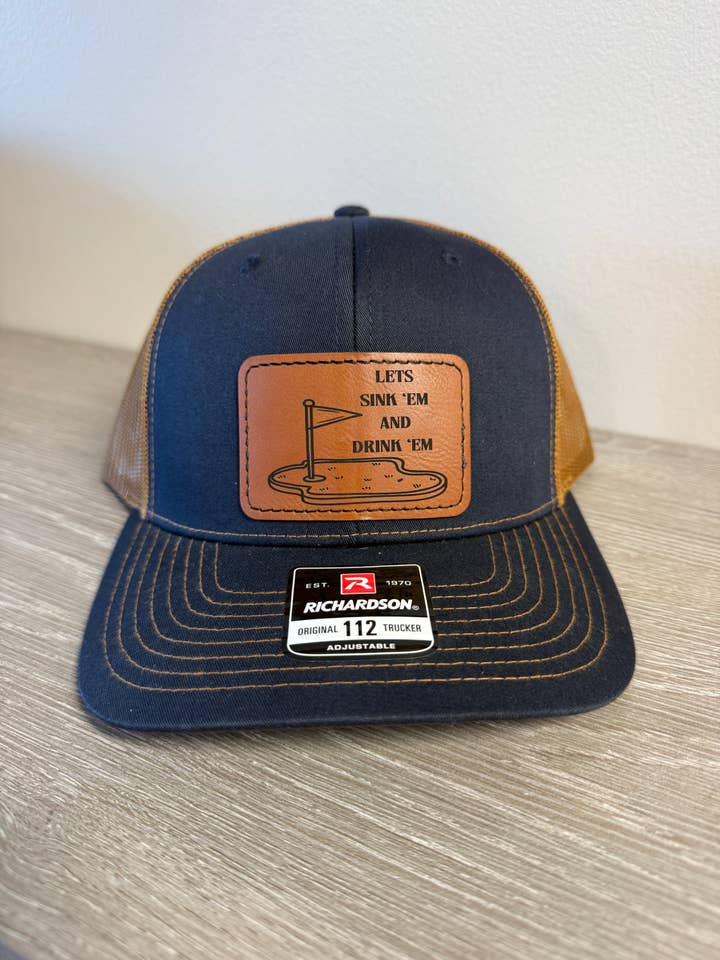 Sink 'Em and Drink 'Em Men's Richardson 112 Trucker Hat for wholesale by Designed To Flaunt