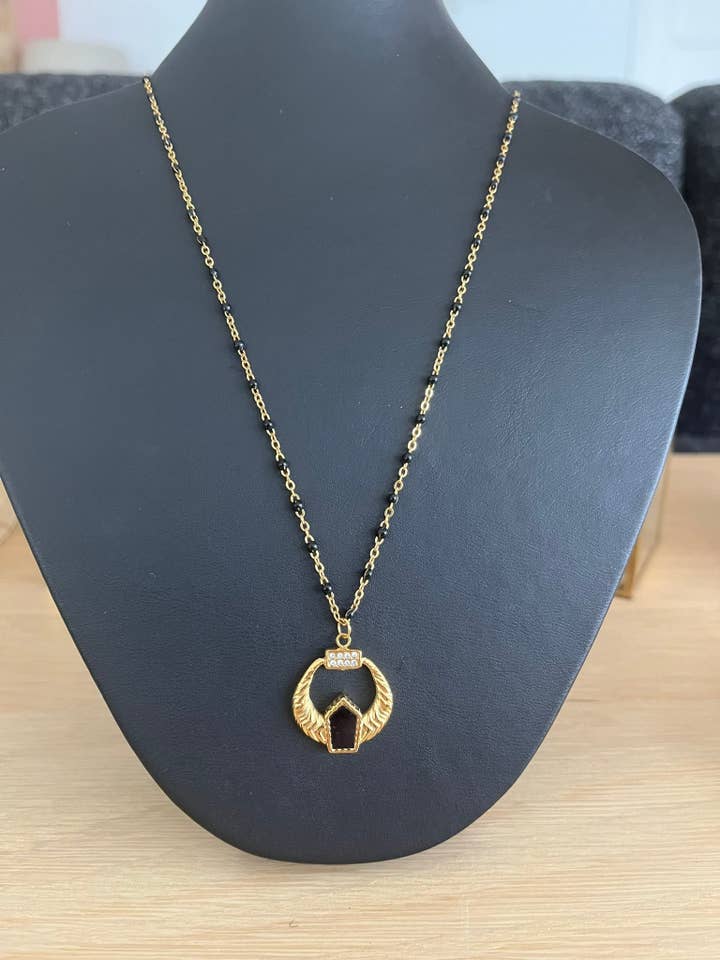 ELIAS necklace - gold and black steel, ethnic pendant for wholesale by Innaya