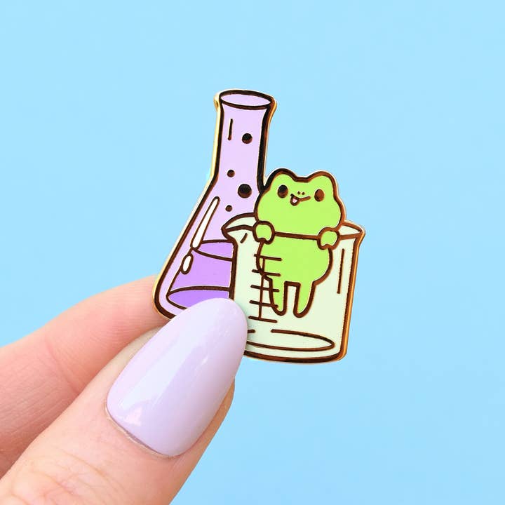 Frog Beaker-Buddy Enamel Pin for wholesale by Sugarnova