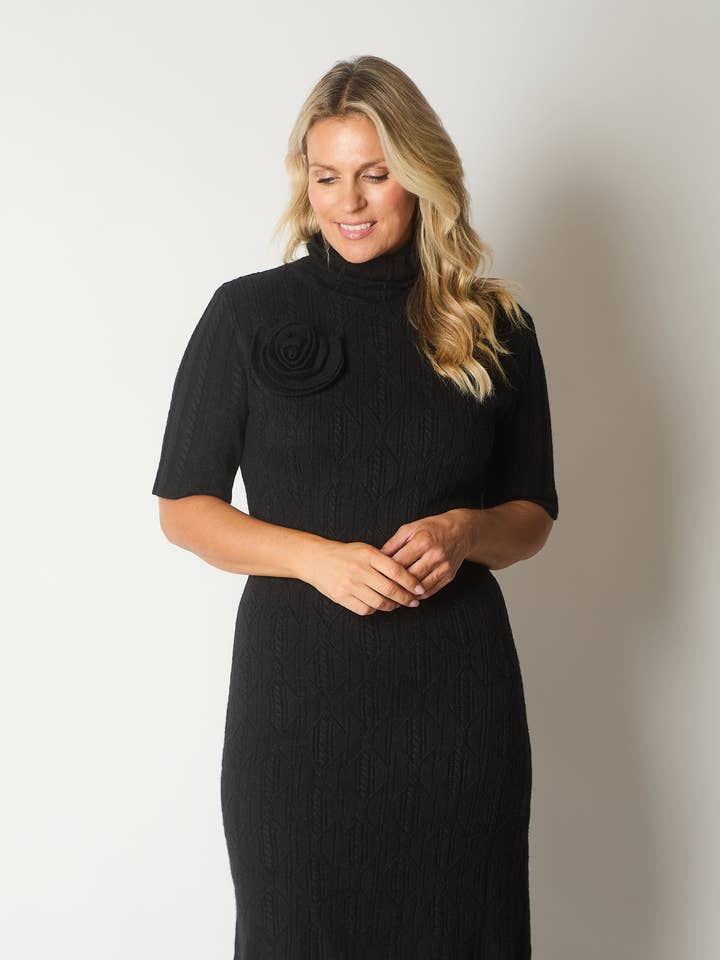 Stickad poloklänning med rosettdetalj - Svart för wholesale av SOLO