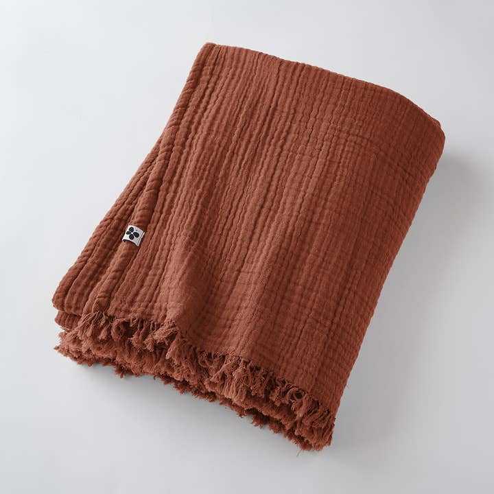 Coperta in terracotta con frange GAÏA 130 x 160 cm per la vendita all'ingrosso da parte di L'effet Papillon