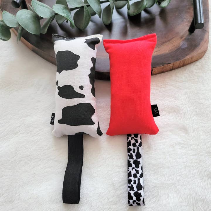 Red Cow Cat Kick Toy for wholesale by Simple Moon Co.