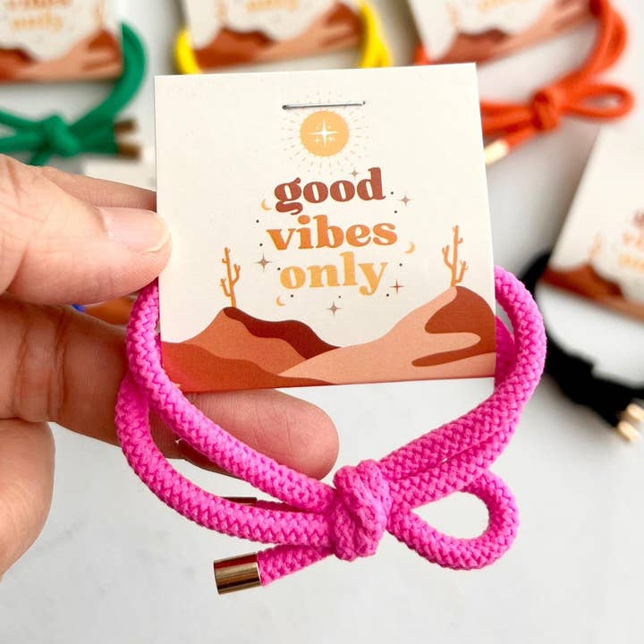 Thank You Gifts "Good Vibes" Boho Shoelace Elastic Hair Tie and other Purchase Wholesale rubber bands. Free Returns & Net 60 Terms on Faire trending on Faire.