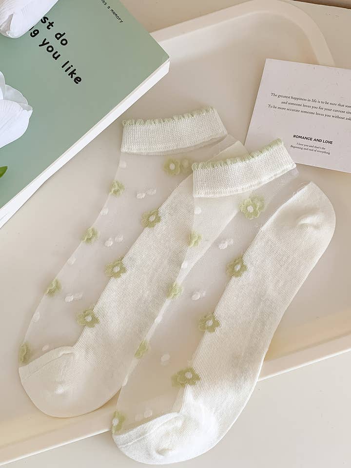 Sheer short socks with green flowers 🌿🤍 for wholesale by Marc JoJo
