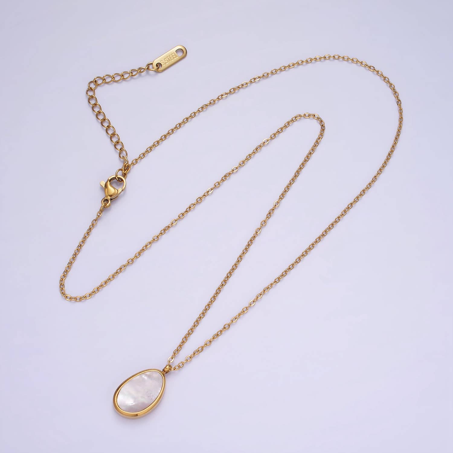 Aim Eternal - Vente Colliers à pendentif - Ras-de-cou en acier inoxydable avec pendentif en forme de perle et lunette abstraite1