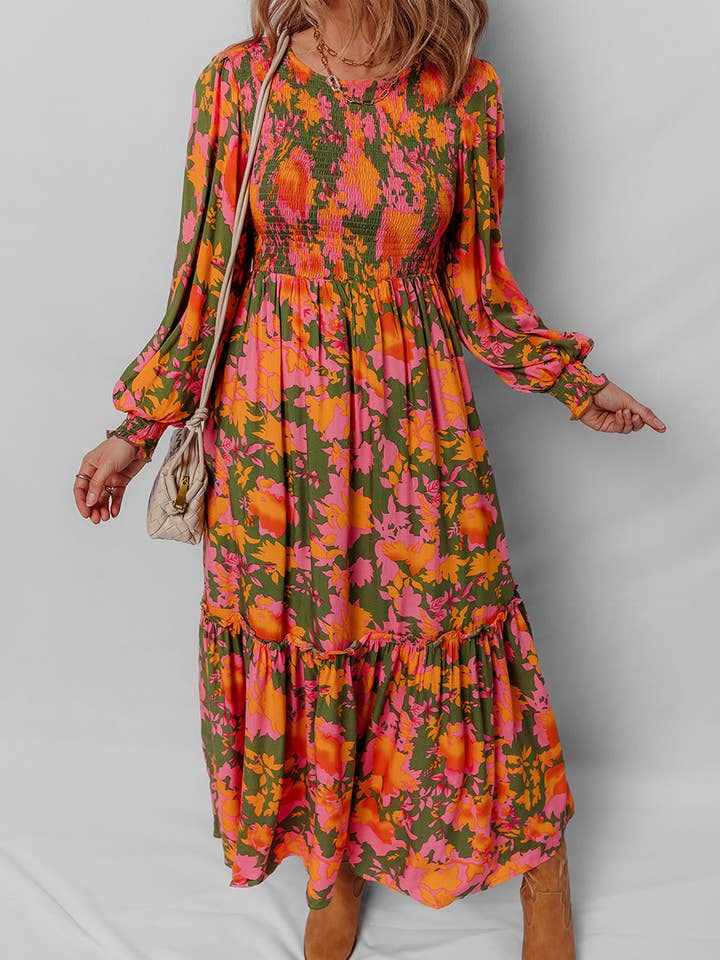 Orange Orange blommig klänning med puffärmar, smockad liv och volanger. för wholesale på Faire10