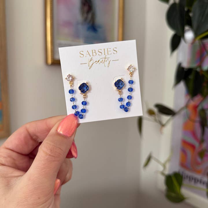 Double clou d'oreille Cristal Bleu et Étoile pour la vente par Sabsies Beauty