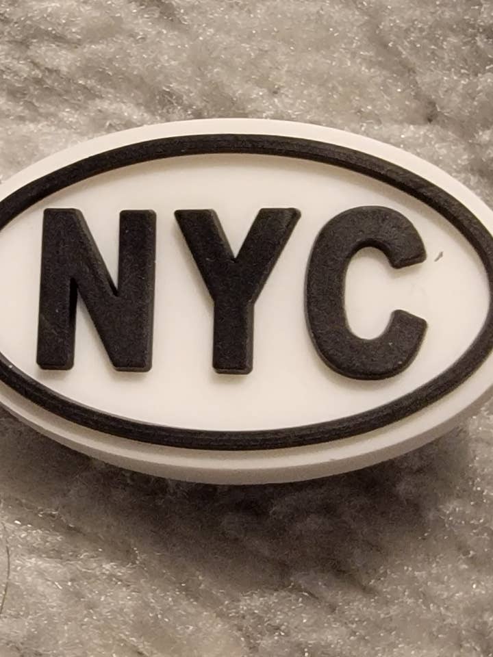 Ciondolo Croc 293 per la vendita all'ingrosso da parte di Oodle Kaboodle LLC