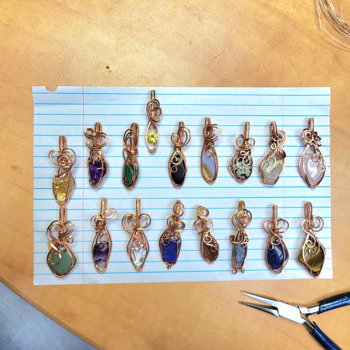 Handmade Wire Wrap Tumbled Stone Pendants Set in Raw Copper for wholesale by Different Branches