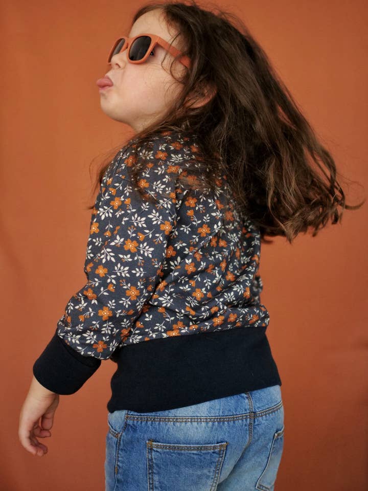 Felpa minimale evolutiva per la vendita all'ingrosso da parte di Petites Menottes