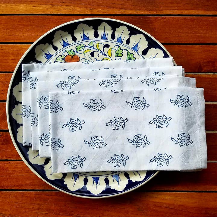 White cotton napkins hand printed with indigo paisleys for wholesale by Indigostep