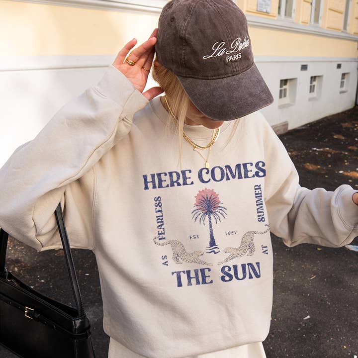 HERE COMES THE SUN GRAPHIC SWEATSHIRTS for wholesale by Illustrated Society