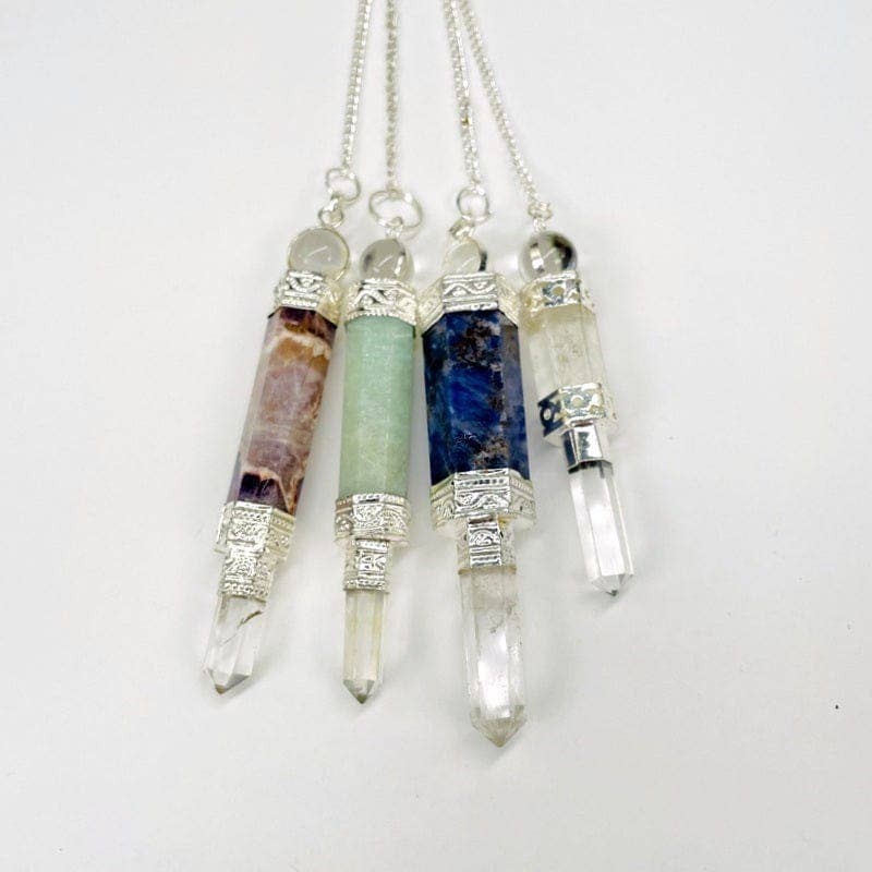 Rock Paradise – wholesale Meditation supplies – Crystal Quartz Point Pendulum with Silver toned Chain7