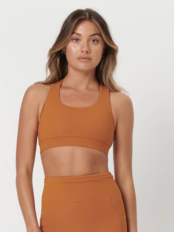 Matilda Sports Bra - Turmeric for wholesale by Two Sparrow Australia