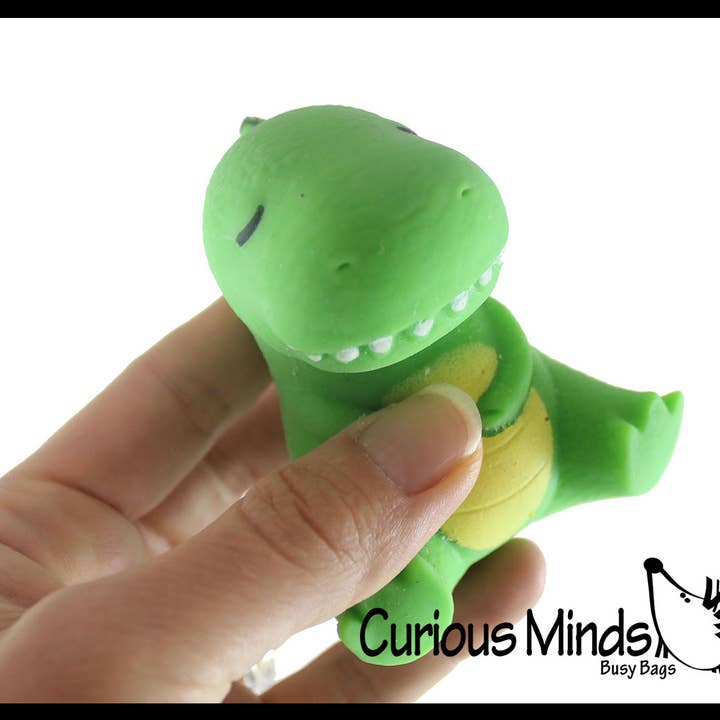 Curious Minds Toys - Wholesale Knijpbal - Kinderen en baby - 1 zachte crèmekleurige stressbal met dinosaurus gevuld met honden - Squishy Gooe7