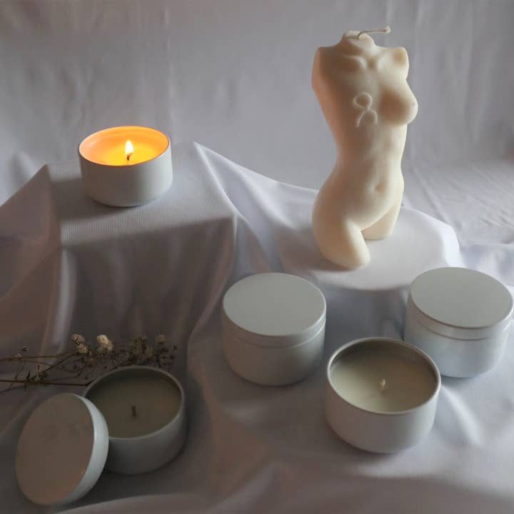 Sample, white tins candles (2oz, No labels) for wholesale by Augustine & Co