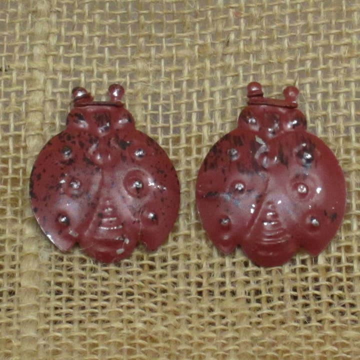 Set of 12 Small Flat Metal Ladybugs for wholesale by A.T. Imports
