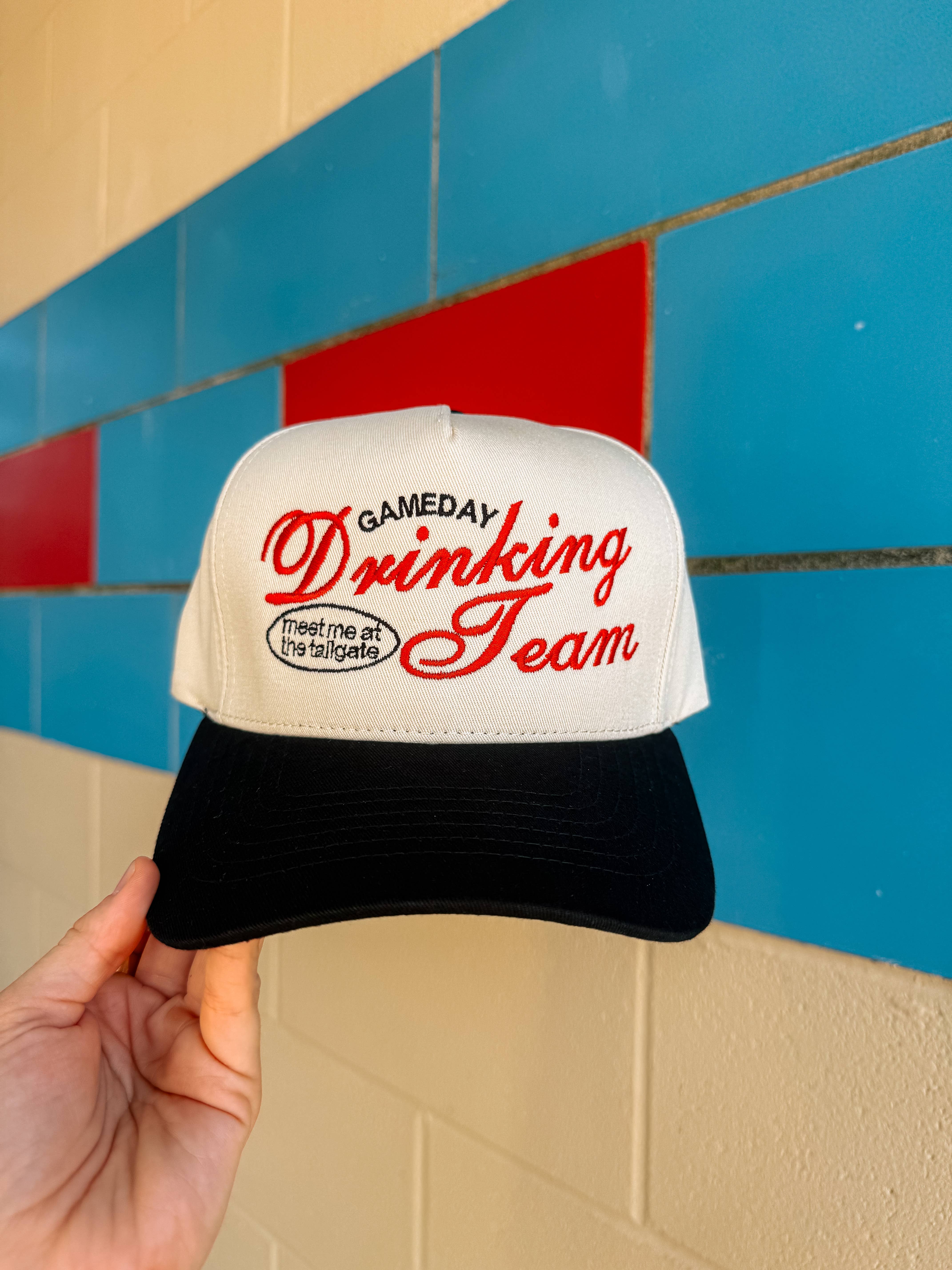 Black Drinking Team Embroidered Trucker Hat for wholesale on Faire