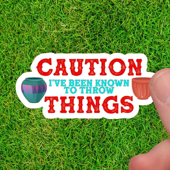 Forsigtig, jeg har været kendt for at kaste ting | Klistermærke til Potter for engroshandel hos Dancing Dolphin Crafts