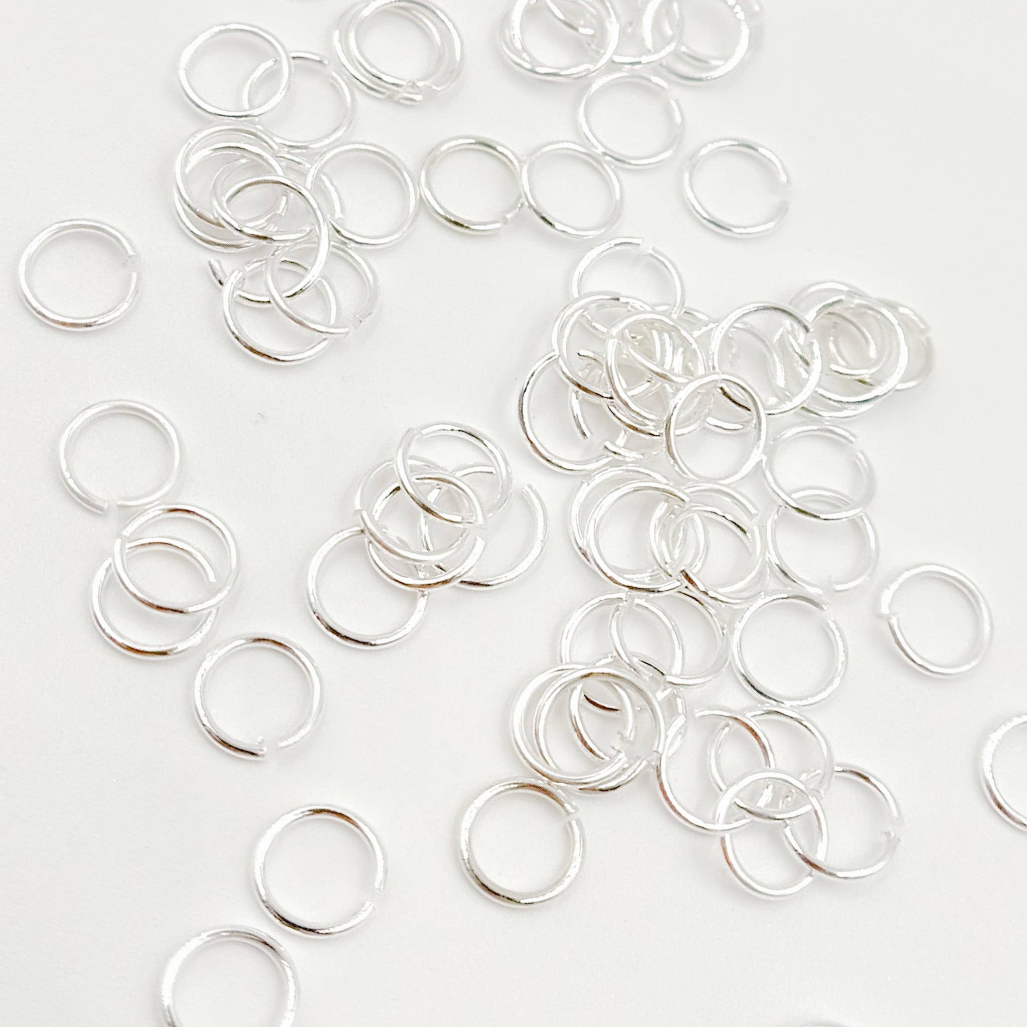 Jewels & Chains - Wholesale Craft Supplies - MFT060DE4. 4MM 22Gauge White Sterling Silver Open Jump Ring1