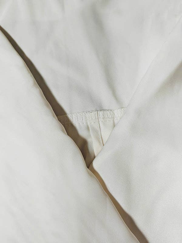 NERO BIANCO Abiti da sera maxi abiti da sera con scollo a V a maniche lunghe in vendita all'ingrosso su Faire13