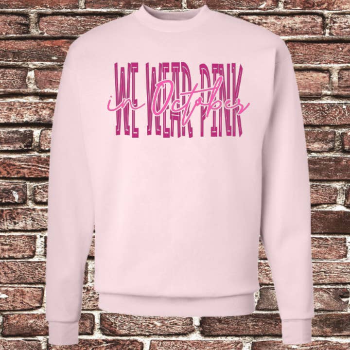 En octobre, nous portons un sweat-shirt graphique rose contre le cancer du sein pour la vente par BB Subs and Screens