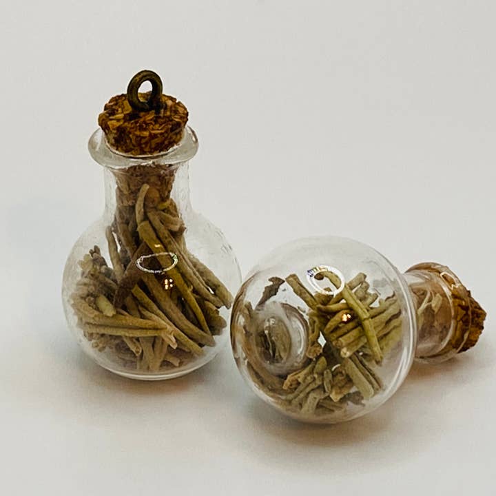 Bottle of dried Rosemary leaves. for wholesale by LilDebby's DeLights