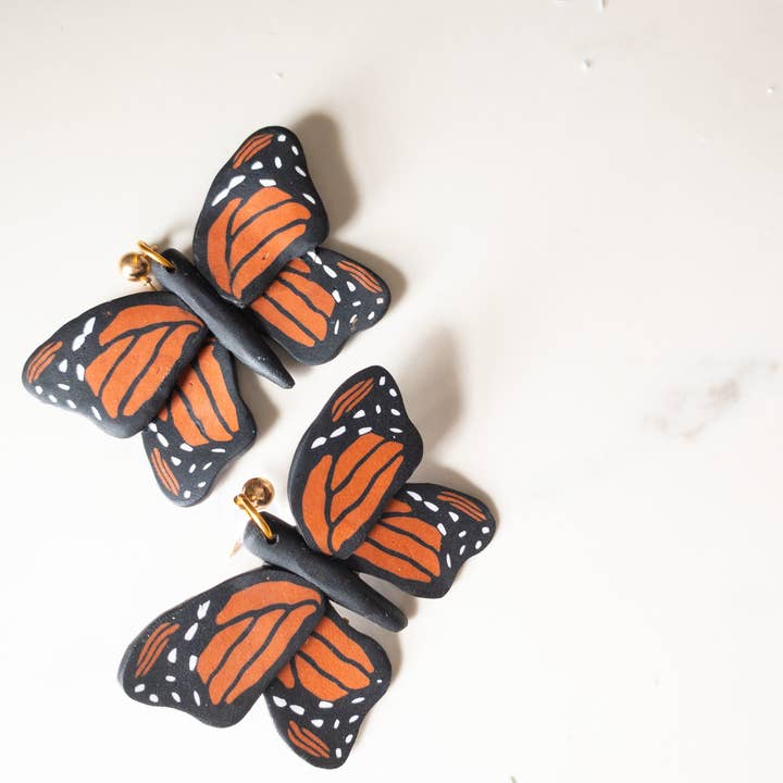 Boucles d'oreilles pendantes papillon pour la vente par Eleven Suns Jewelry