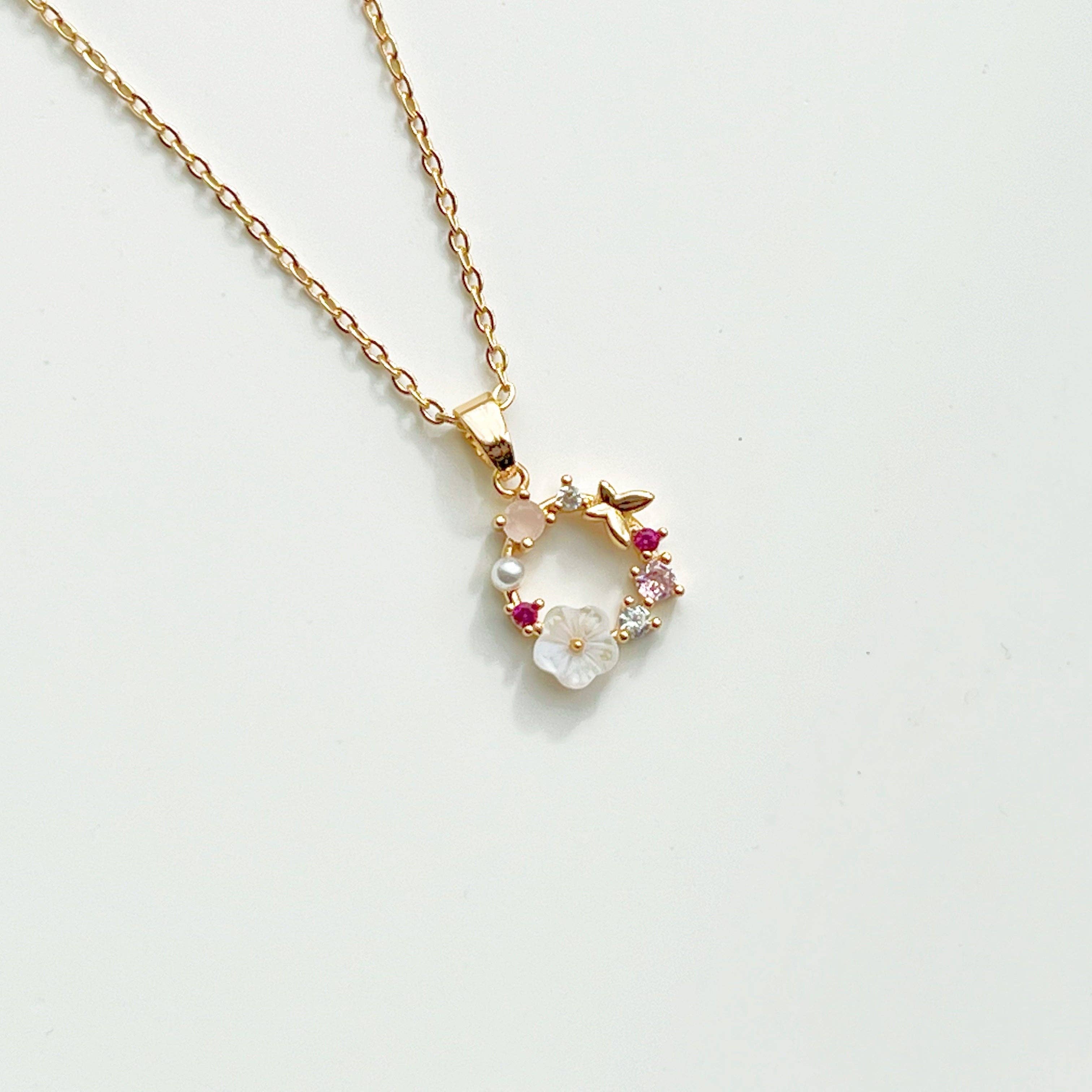 Ninaouity - Venta al por mayor Collares con colgantes/abalorios - Collar de corona de flores doradas - con cristal rosa y perla4