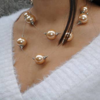 Handgjorda pärlor på ståltråd halsband för wholesale av Declic