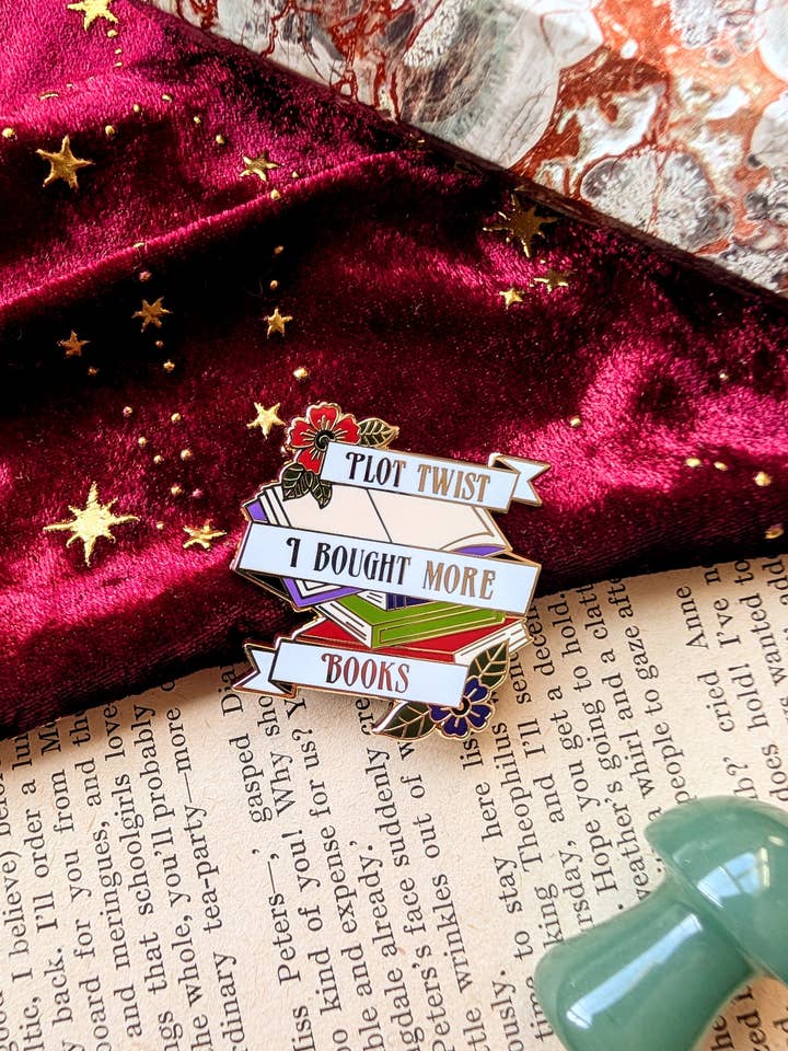 Plot Twist I Bought More Books hard enamel pin for wholesale by Joyella Design