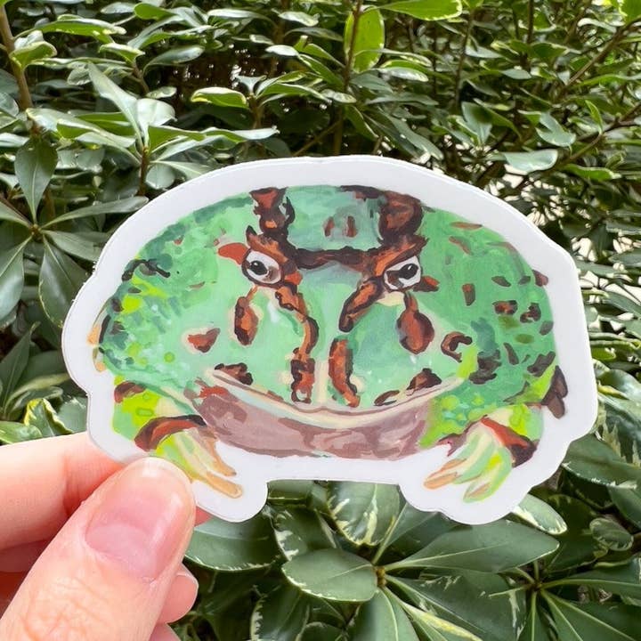 teal green pacman frog watercolor vinyl sticker 3x2" - weatherproof decal - blue frog matte sticker for wholesale by Stephanie Missan Studio