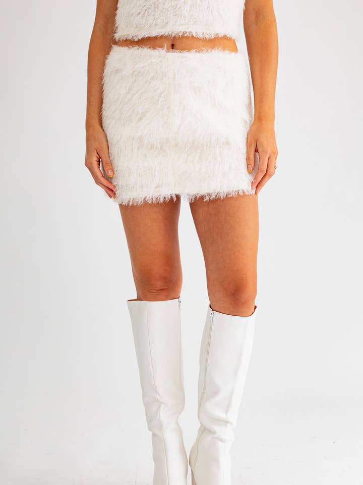 MINI-JUPE TAILLE BASSE pour la vente par LE LIS