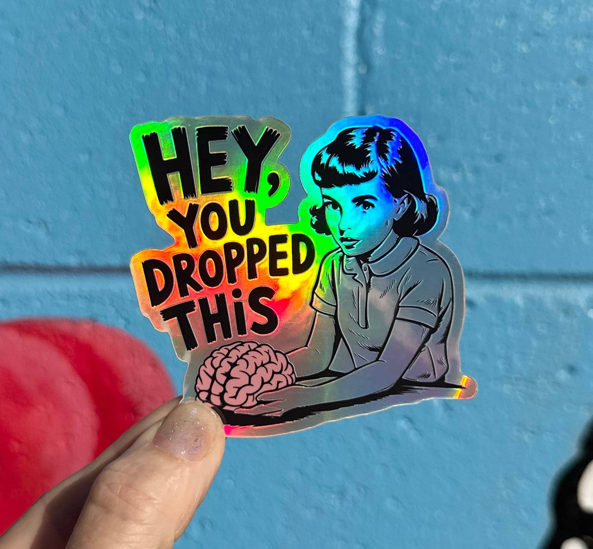 Hilarious Humanitarian - Wholesale Sticker - Hey, You Dropped This Holographic Sticker0