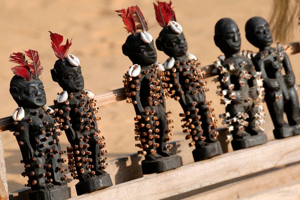 Multi Color African Voodoo Dolls Nkisis Efigies Spirit Souls In A Row Photo Poster for wholesale on Faire0