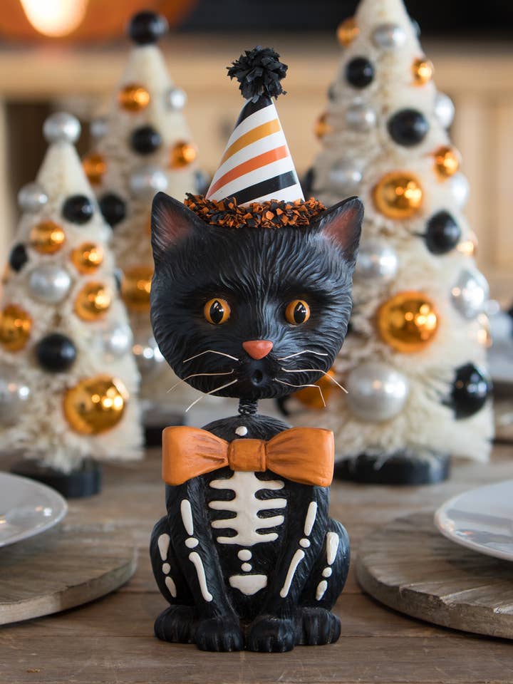 Sourpuss Bobble Head for wholesale by Bethany Lowe Designs