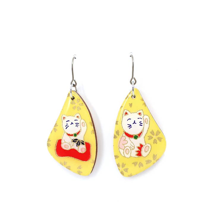 Yellow Manekineko luckey cat titanium dangle earrings for wholesale by autumn + tree