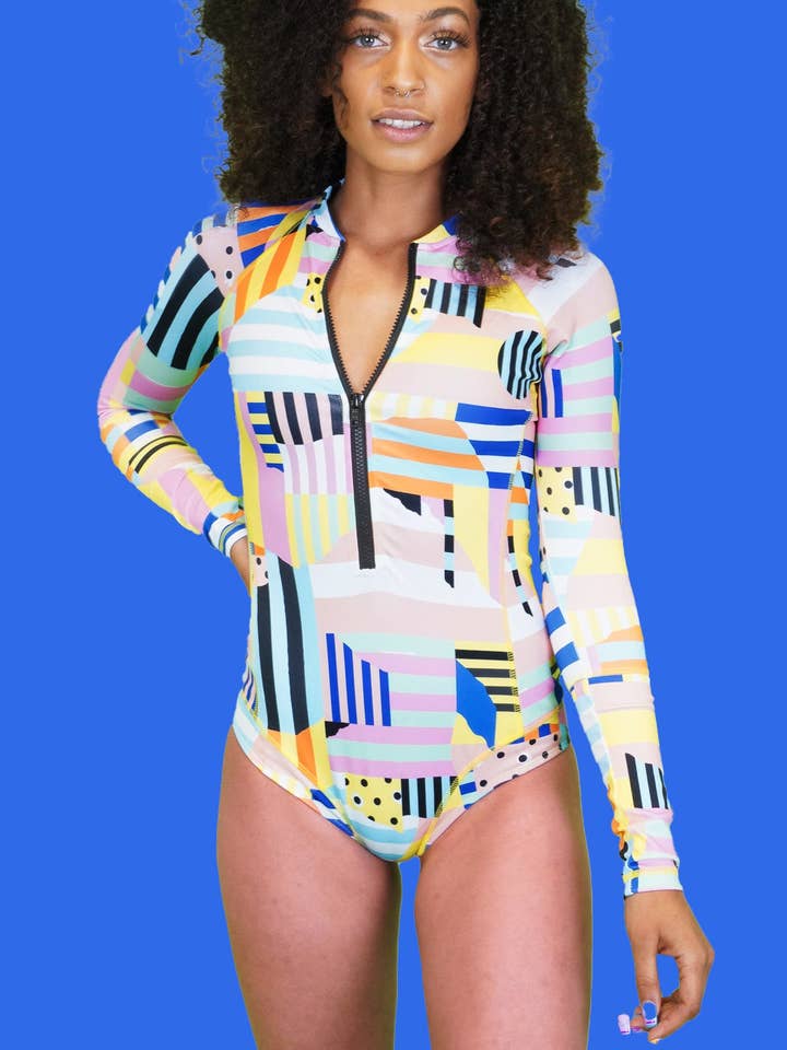 The Cameron Zippy Bodysuit for wholesale by Gazzybygazzo