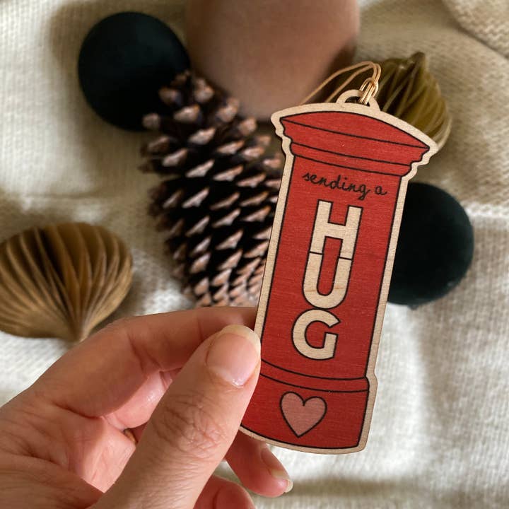 Send a Hug wooden Christmas Decoration | Red London post box for wholesale by Fearless Flamingo