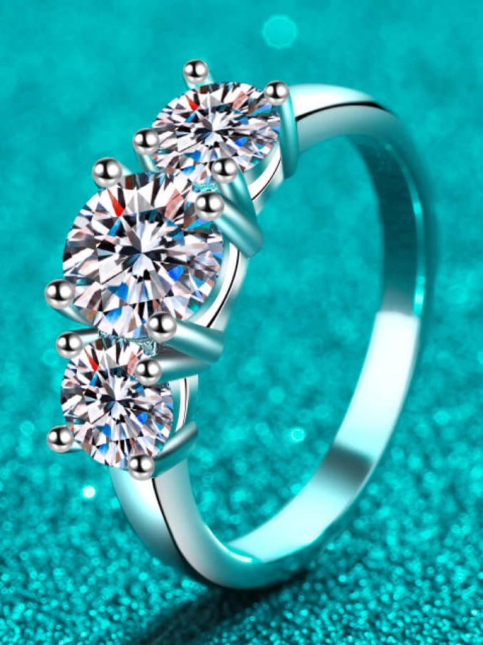Stylish Rhodium Over Pure Sterling Silver 3 Stone Moissanite Ring for wholesale by Sparkala