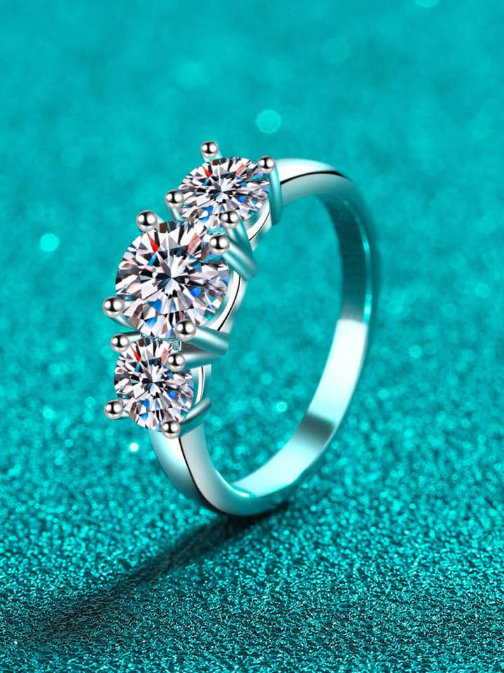 Stylish Rhodium Over Pure Sterling Silver 3 Stone Moissanite Ring for wholesale by Sparkala
